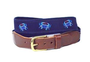 Detailed blue crab ribbon belt with shades of blue crabs and red pinchers on a navy ground